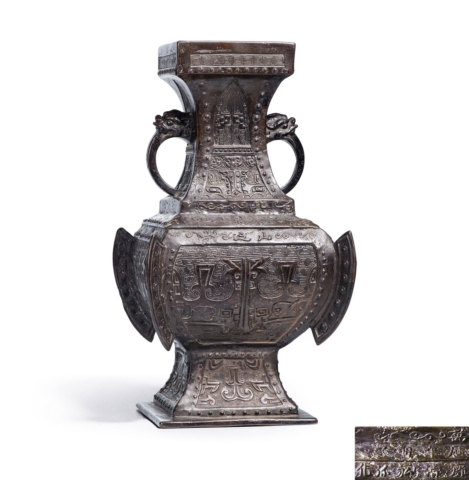 铜浮雕饕餮纹兽耳出戟方瓶