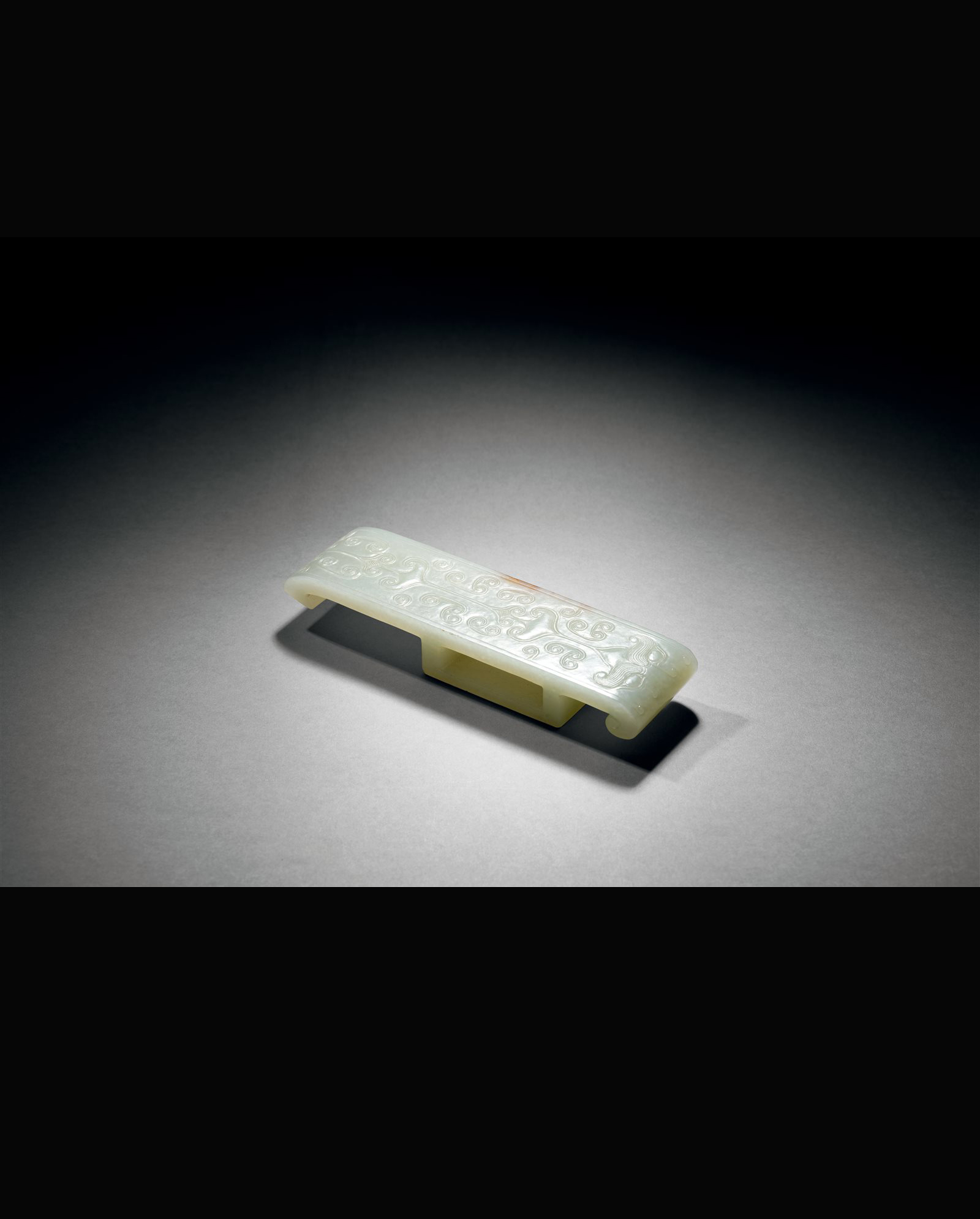 白玉兽面勾连云纹墨床