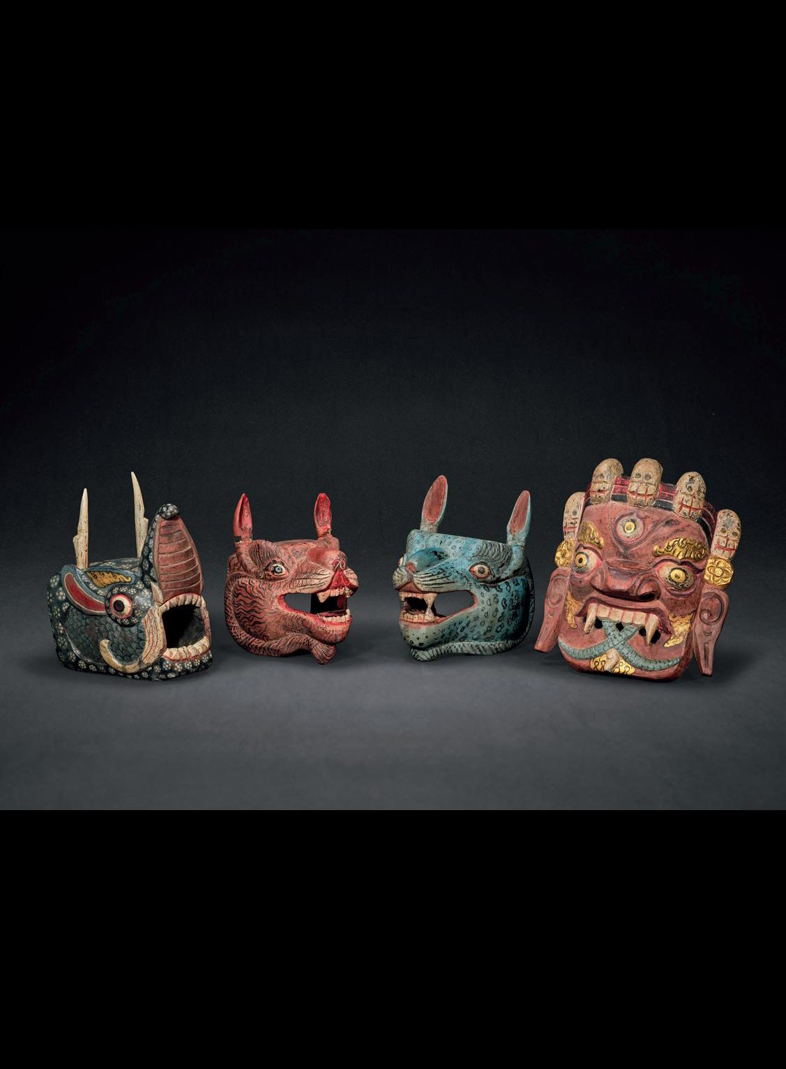 十九世纪 木雕彩绘面具四件